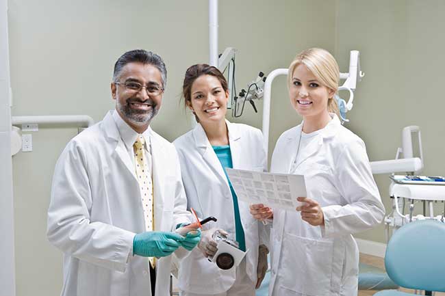Three Dentist in Clinic