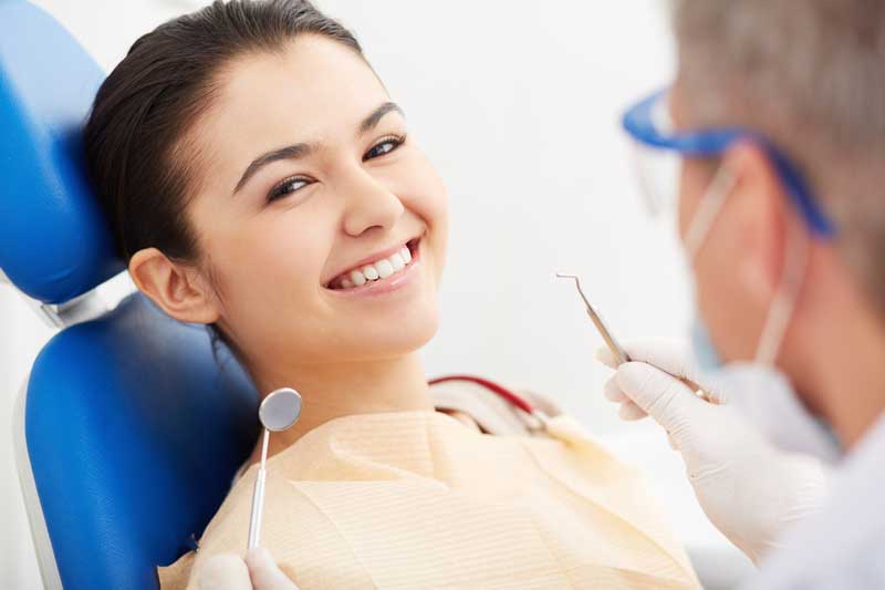 Happy Patient and Doctor in Clinic