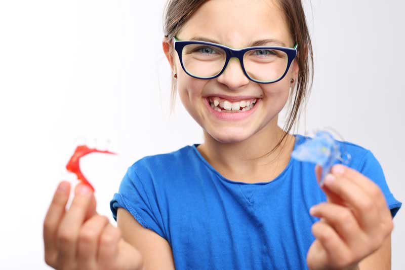 Girl is Hanging a Mouth Guard