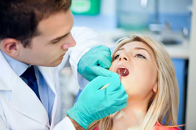 Doctor with Patient in Clinic