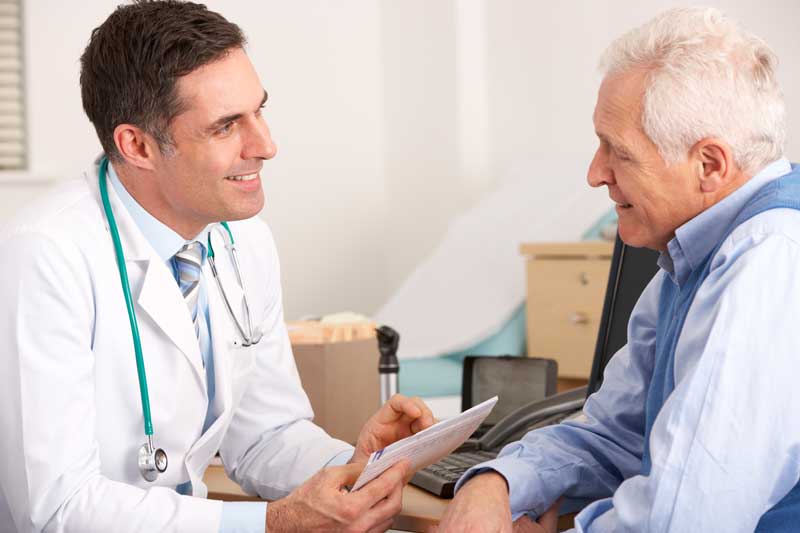 Doctor with Patient in Clinic