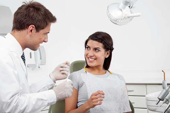 Doctor with Patient In Clinic